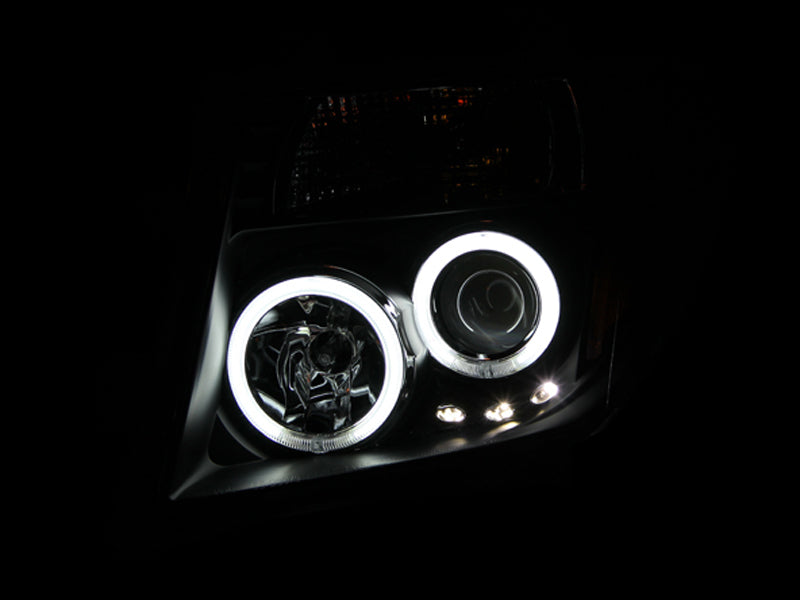 ANZO 2005-2008 Nissan Frontier Projector Headlights w/ Halo Black.