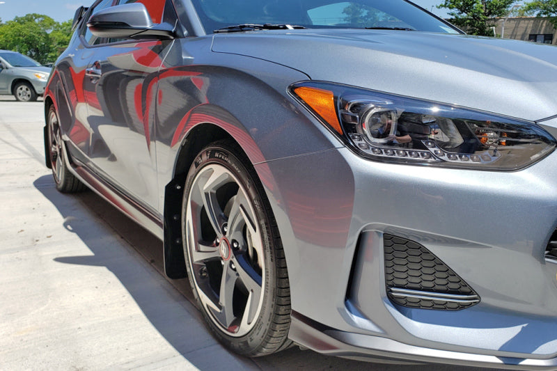 Rally Armor 2019+ Hyundai Veloster Turbo R-Spec UR Black Mud Flap w/ White Logo.