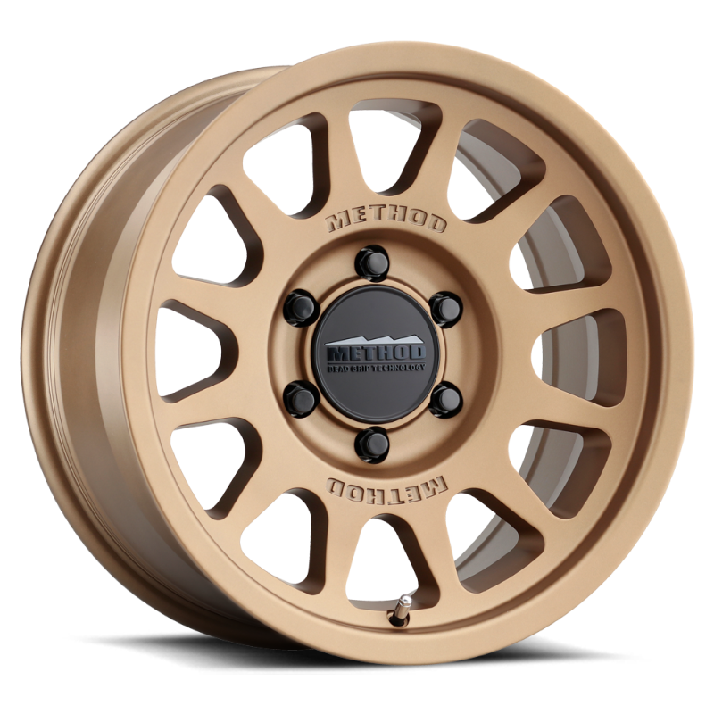 Method MR703 17x8.5 0mm Offset 6x5.5 106.25mm CB Method Bronze Wheel.
