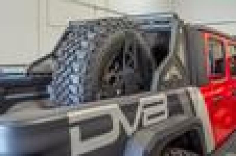 DV8 Offroad 2019+ Jeep Gladiator Universal Stand Up In-Bed Tire Carrier.