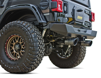 Gibson 12-17 Jeep Wrangler Sport 3.6L 2.5in Patriot Skull Series Cat-Back Dual Exhaust - Blk Ceramic.