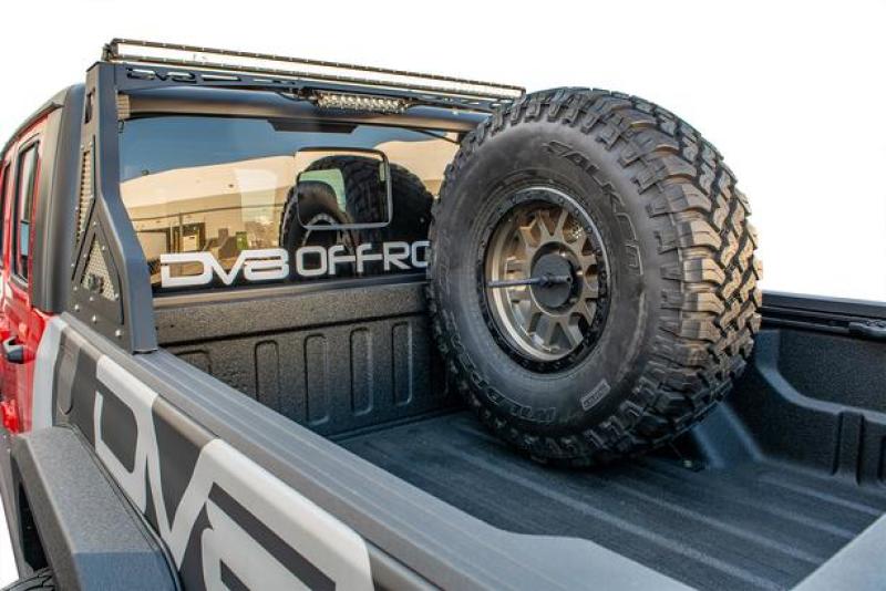 DV8 Offroad 2019+ Jeep Gladiator Universal Stand Up In-Bed Tire Carrier.