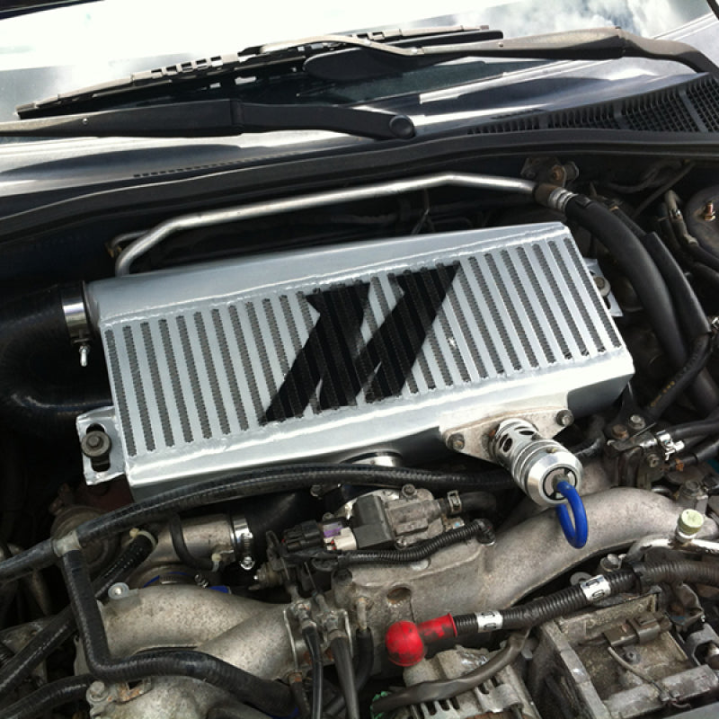 Mishimoto Subaru 02-07 WRX/04-07 STi Top-Mount Intercooler Kit - Powder Coated Silver & Red Hoses.
