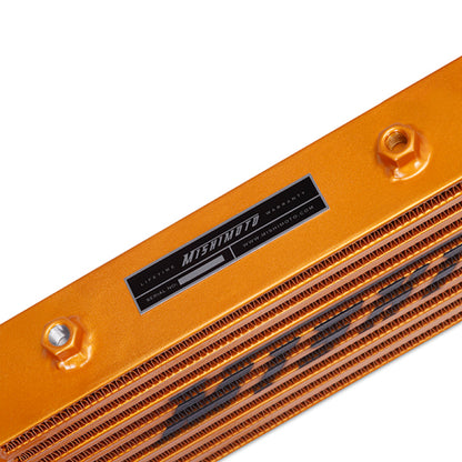 Mishimoto Universal Gold Z Line Intercooler  Overall Size: 28x8x3 Core Size: 21x6x2.5 Inlet / Outlet.