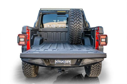 DV8 Offroad 2019+ Jeep Gladiator Universal Stand Up In-Bed Tire Carrier.
